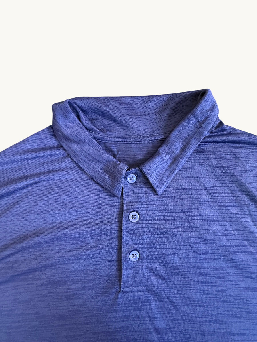 Polo acanalado azul rey profundo